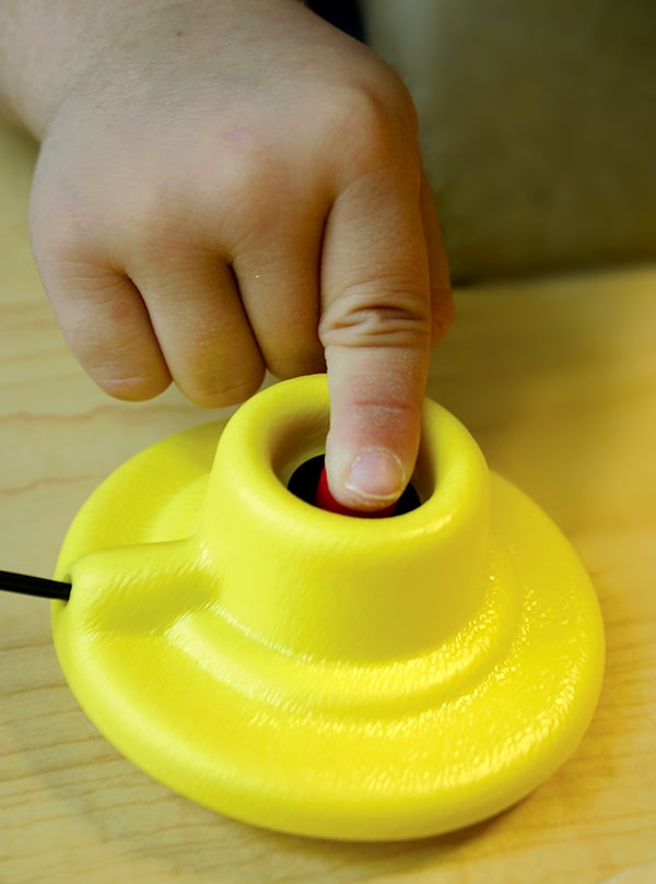 Finger Isolation Button side view