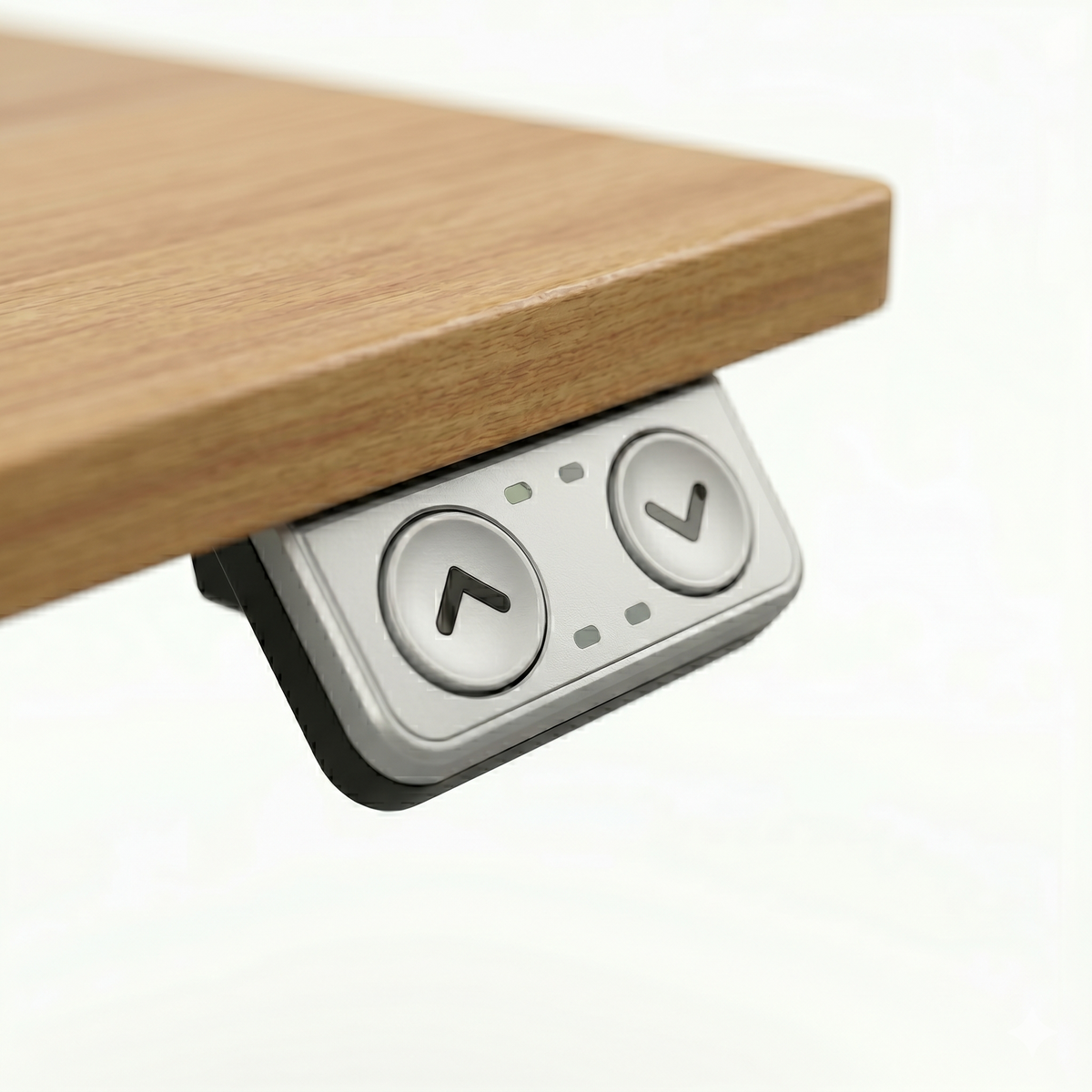 Close-up image of the adjustment buttons of an adjustable table