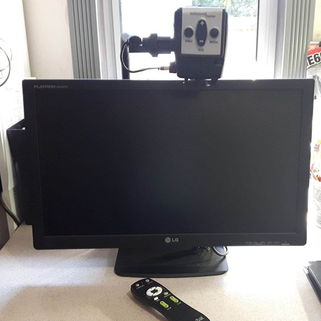 A used desktop CCTV unit sits on a table