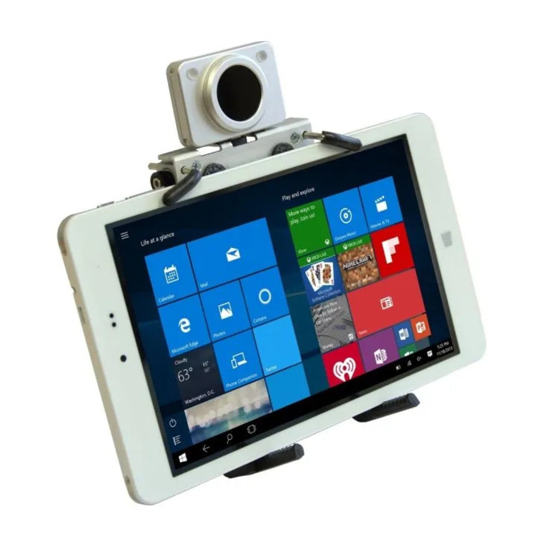A headpointing system is attached to a tablet against a white background.