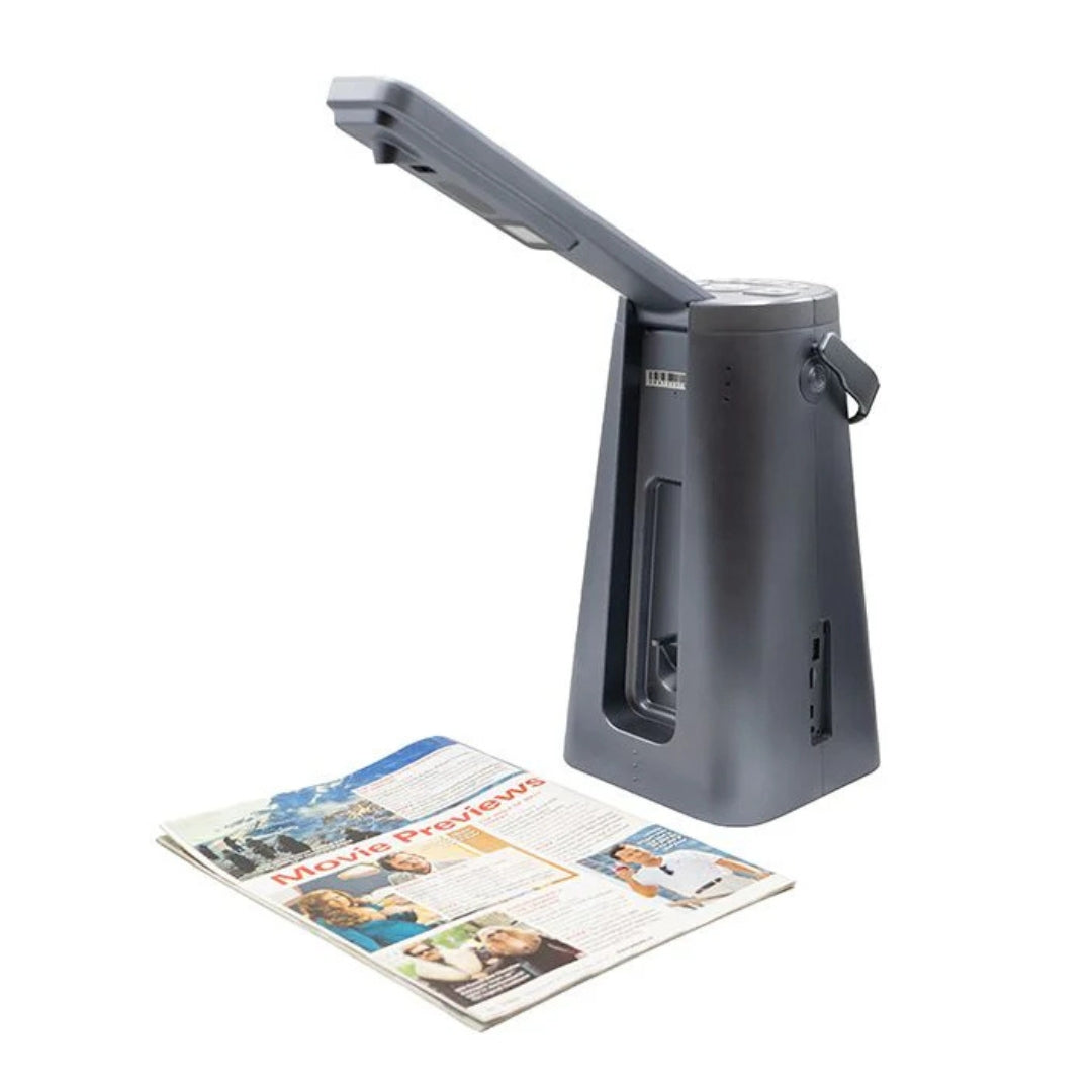 Scanning Camera and a magazine sits against a white backdrop