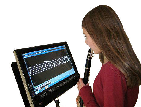 Girl playing clarinet using Lime Lighter large print music system