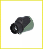 Green and black monocular telescope on a white background