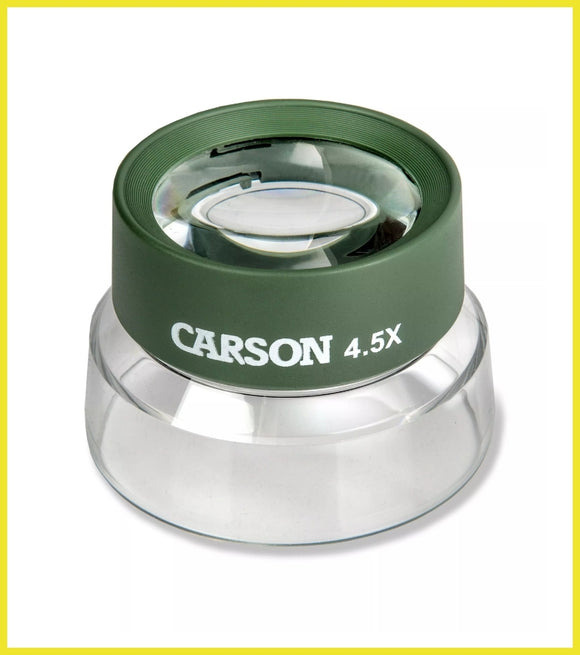 Carson magnifying glass with green rim and clear base on a white background