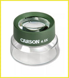 Carson magnifying glass with green rim and clear base on a white background