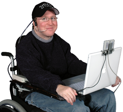 Person in a wheelchair using a laptop with a headset on a white background