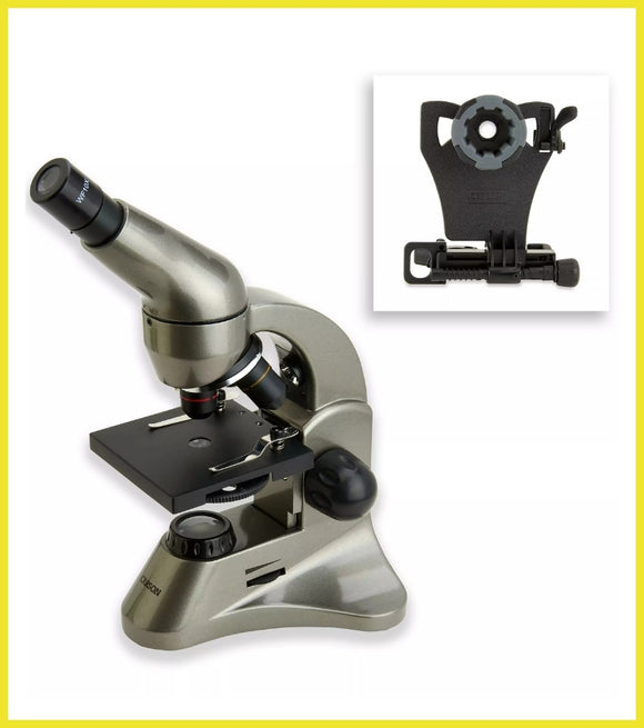 Microscope with a close-up inset of a clamp on a white background