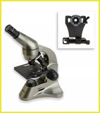 Microscope with a close-up inset of a clamp on a white background