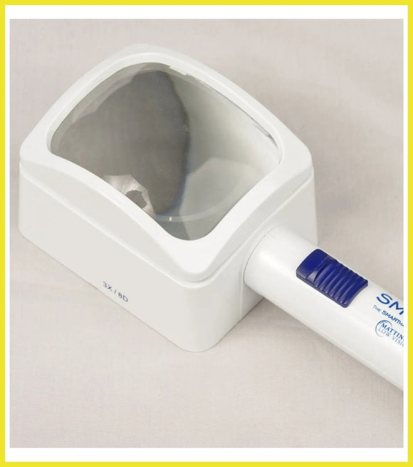 White magnifying glass with blue handle on a light gray background