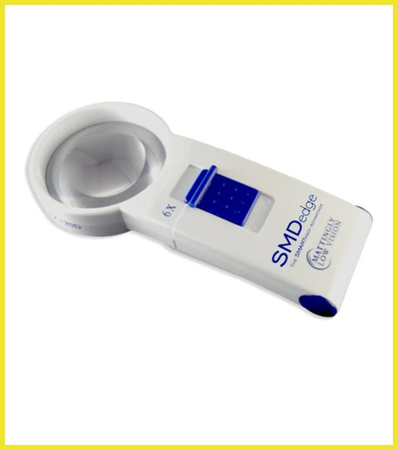 Handheld optical magnifier with digital display on a white background