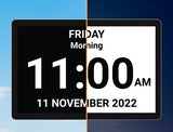 Digital clock display showing time and date on a split background of blue and dark sky.