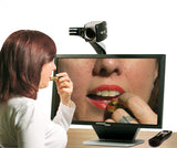 Woman applying makeup with Acrobat HD ultra Electronic Magnifier