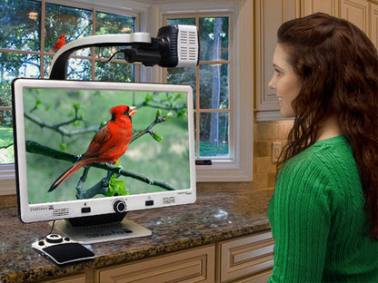 Woman watching a bird far distance viewing